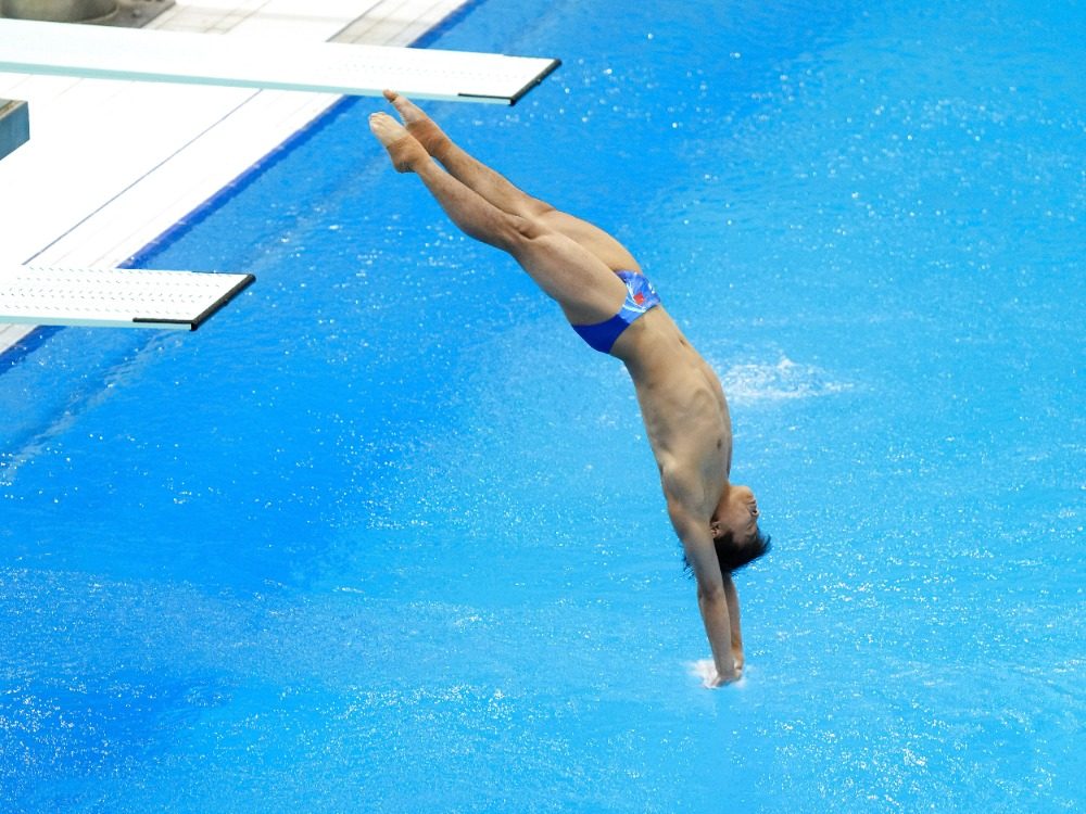 图片新闻｜大运会：张文澳、胡宇康分获跳水男子一米板冠亚军