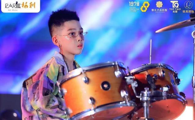 11岁广州少年敲鼓7年拿金奖，他如何用节奏征服星海舞台？