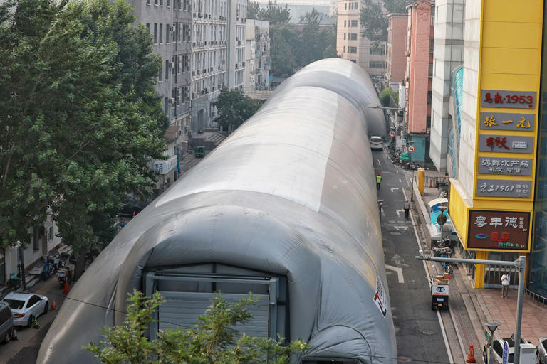 控制施工扬尘和噪声污染，北京首例线性工程气膜设施落地