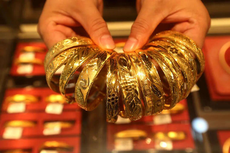 金饰克价首破1400元